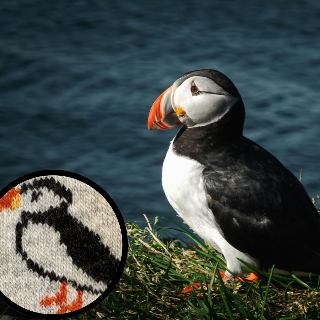 Wollsocken mit Papageitaucher der Färöer-Inseln als nordisches Tiermotiv aus Naturwolle.